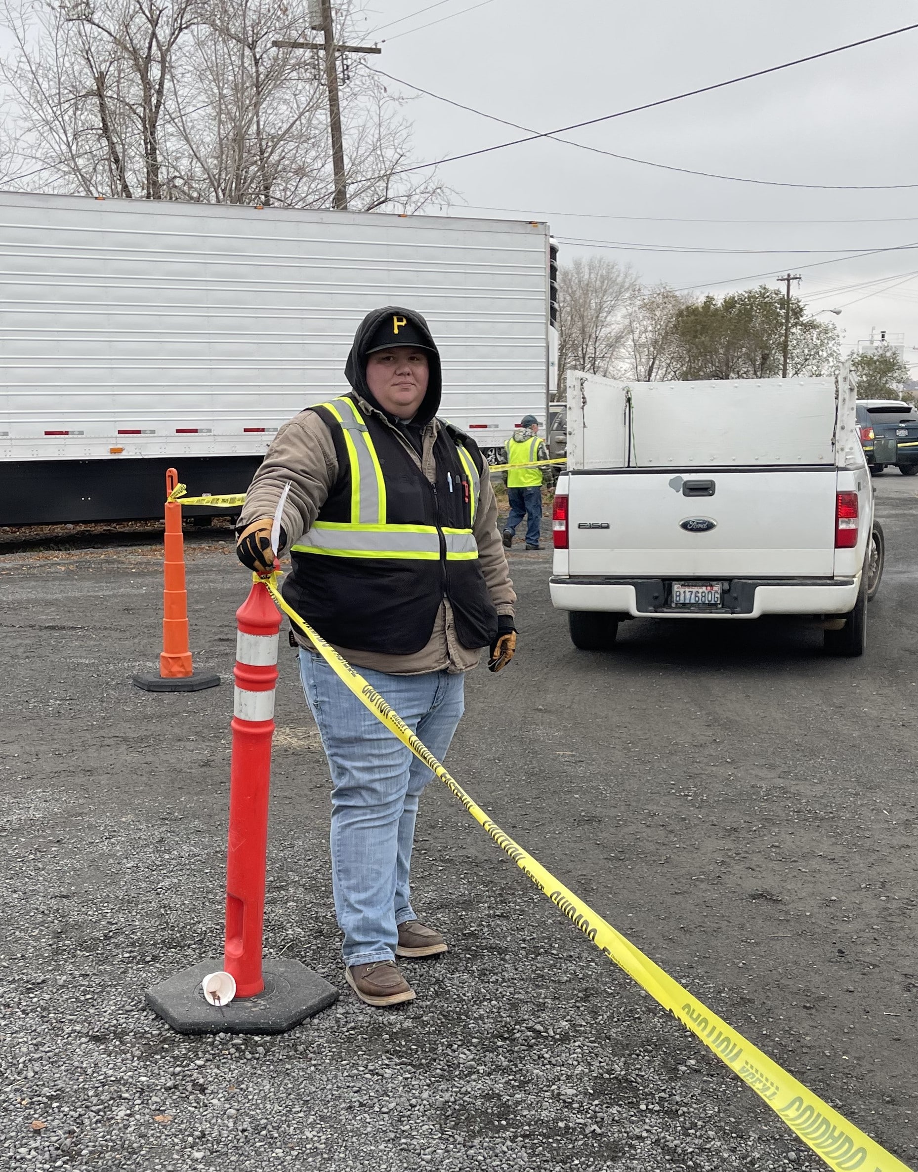 Tyson directs traffic in the receiving area outside of Community Services of Moses Lake.