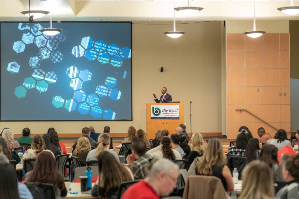 Keynote speaker, Horacio Sanchez, presents to a room full of attendees at the Workforce Collaboration Summit at Big Bend Community College.