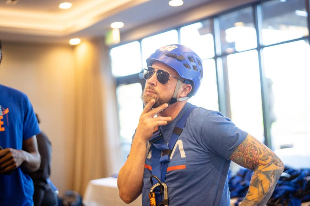 A man with a curious look at CDCAC Over the Edge event